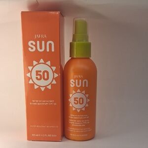JAFRA Sun SPF 50 Orange Bottle with Green Spray Cap